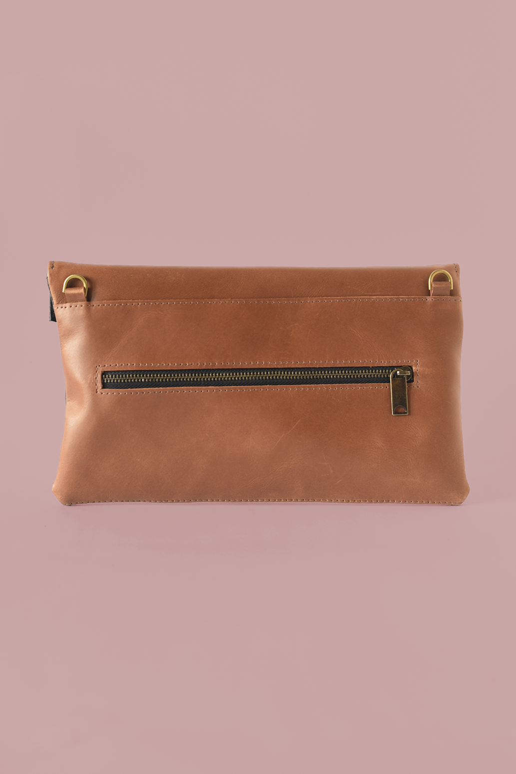 Handmade Brown leather convertible crossbody & clutch with a zipper from a Certified B Corp